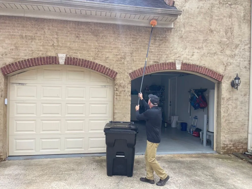 Scott Gilbert removing webbing from a Dora, Alabama home. Scott Gilbert removing webbing from a Dora, Alabama home.